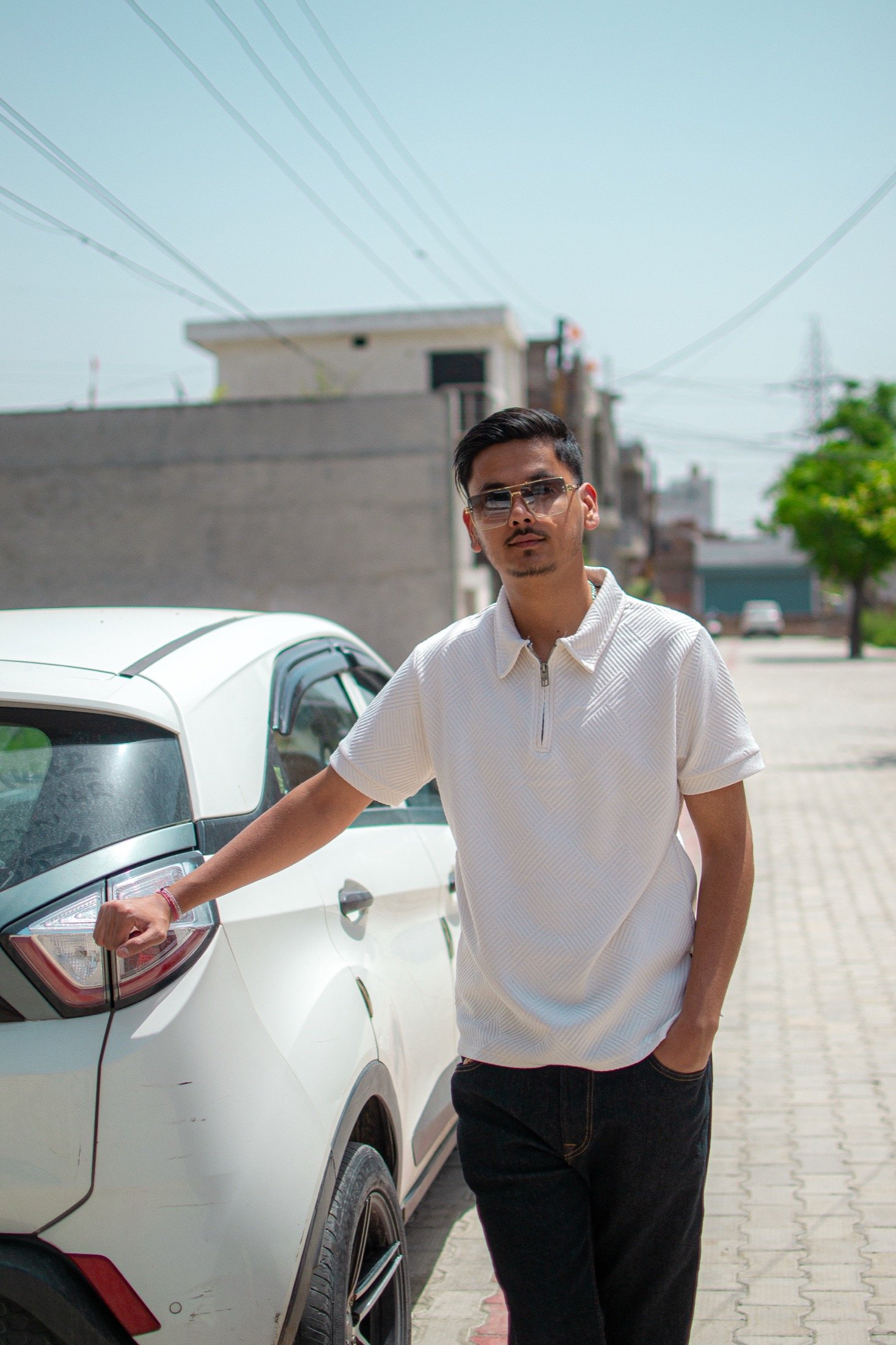 Sanchit Gogna in sunglasses on a city street